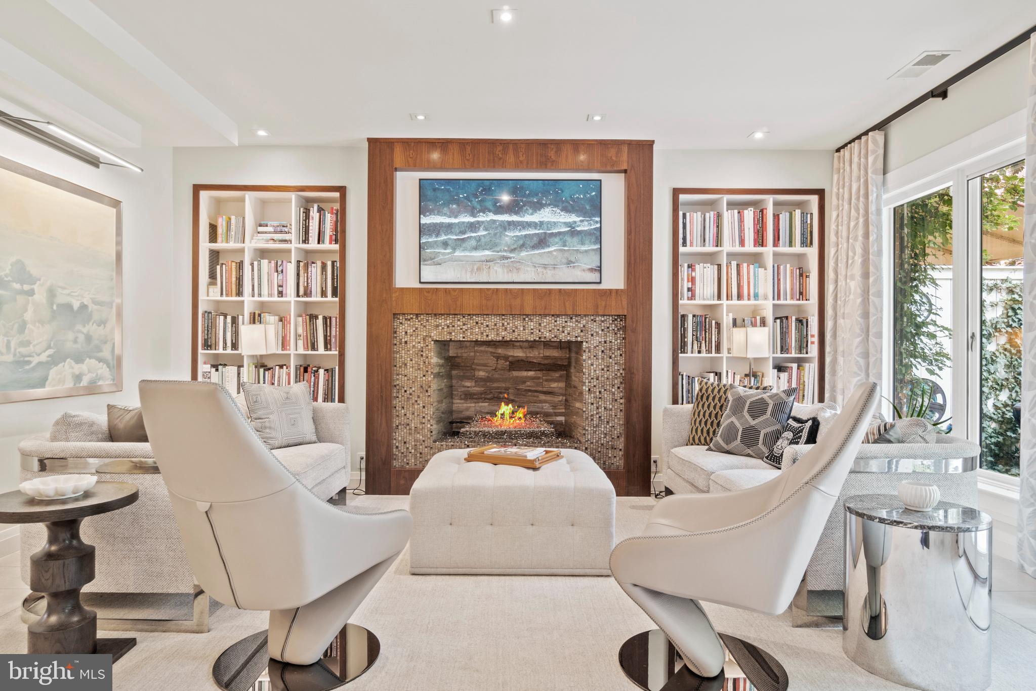 3323 R Street Northwest Washington, DC 20007 - Photo 4 of 54 Garden Room: gas fireplace and custom built-ins