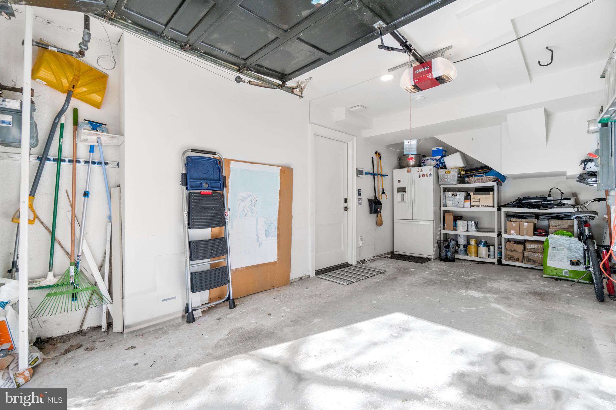 3323 R Street Northwest Washington, DC 20007 - Photo 54 of 54 One-car garage with 2nd refrigerator and storage