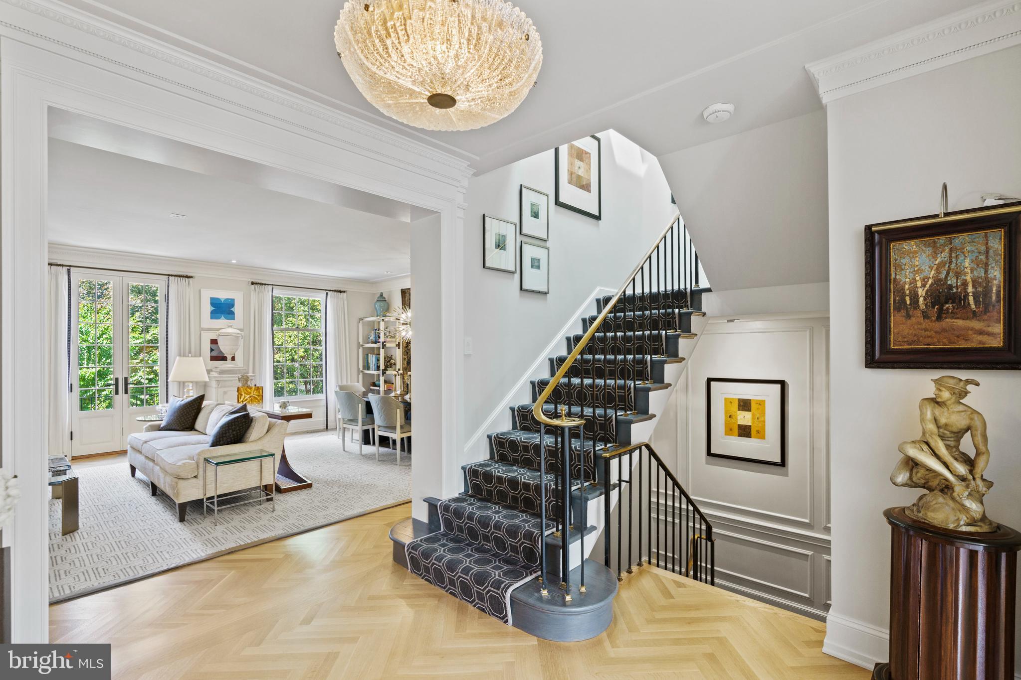 3323 R Street Northwest Washington, DC 20007 - Photo 6 of 54 Main level landing - original brass bannister