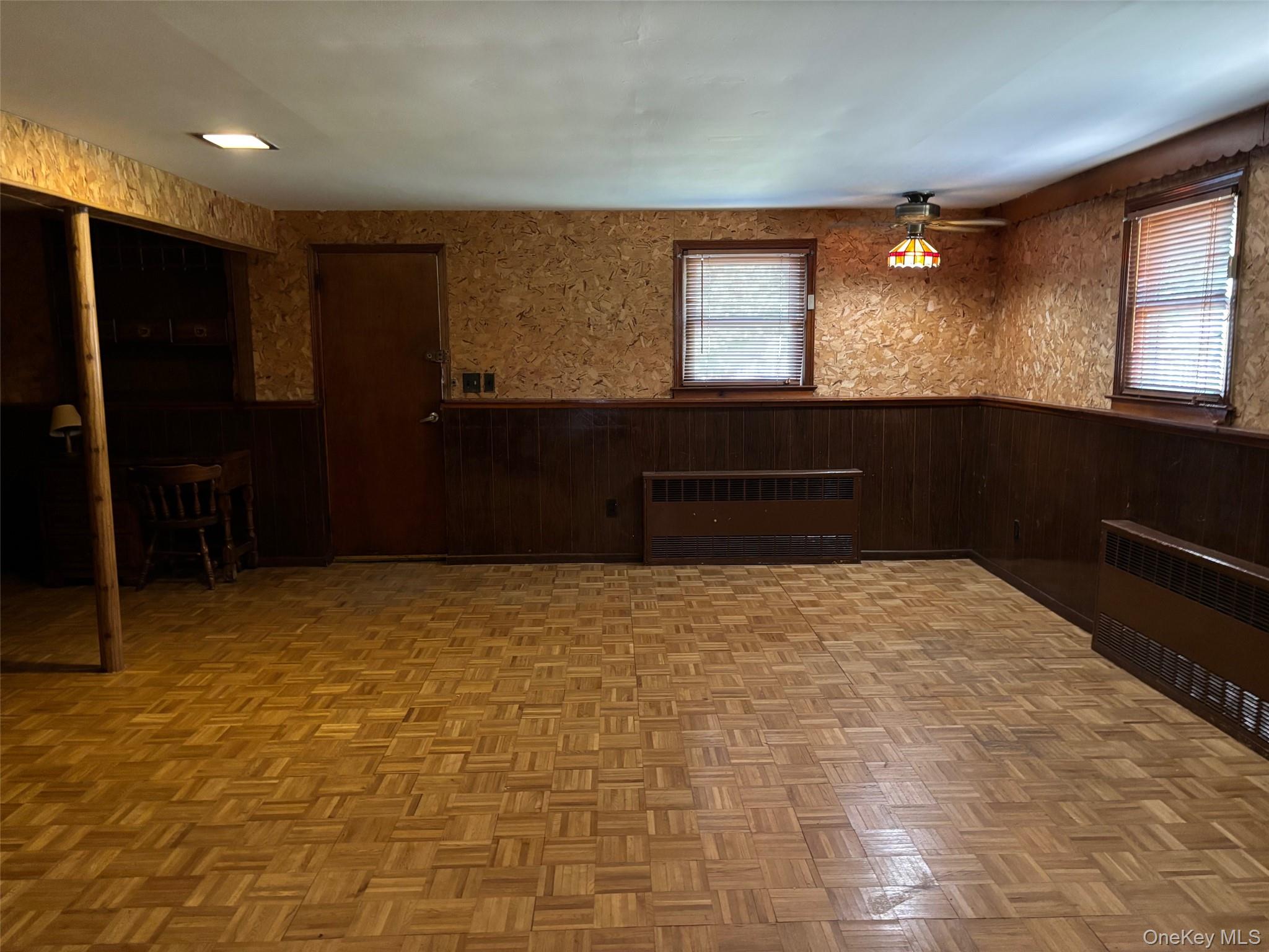 10 13th Avenue West Babylon, NY 11704 - Photo 19 of 33 a bedroom with a bed and a dresser