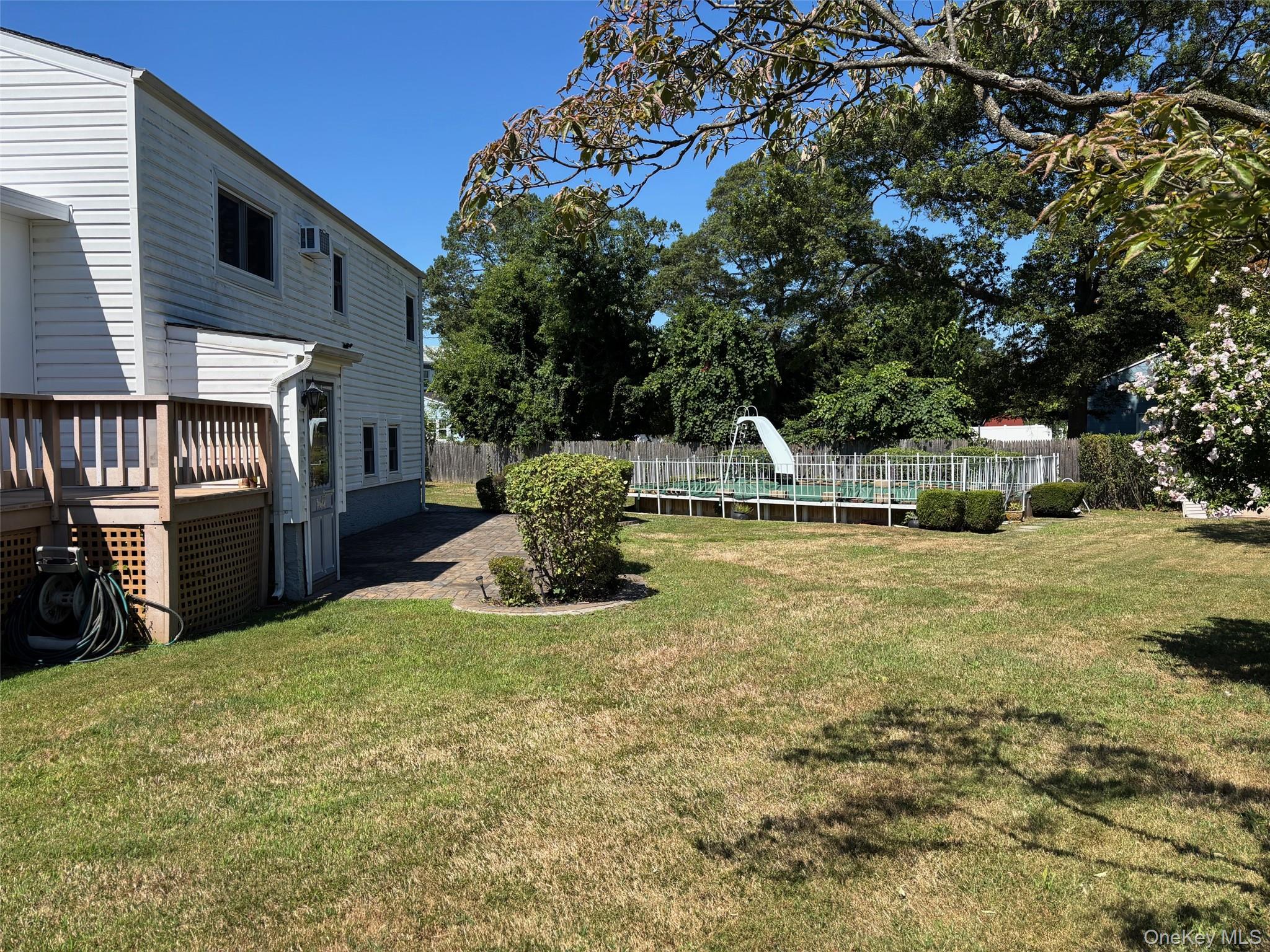 10 13th Avenue West Babylon, NY 11704 - Photo 24 of 33 a view of back yard of the house