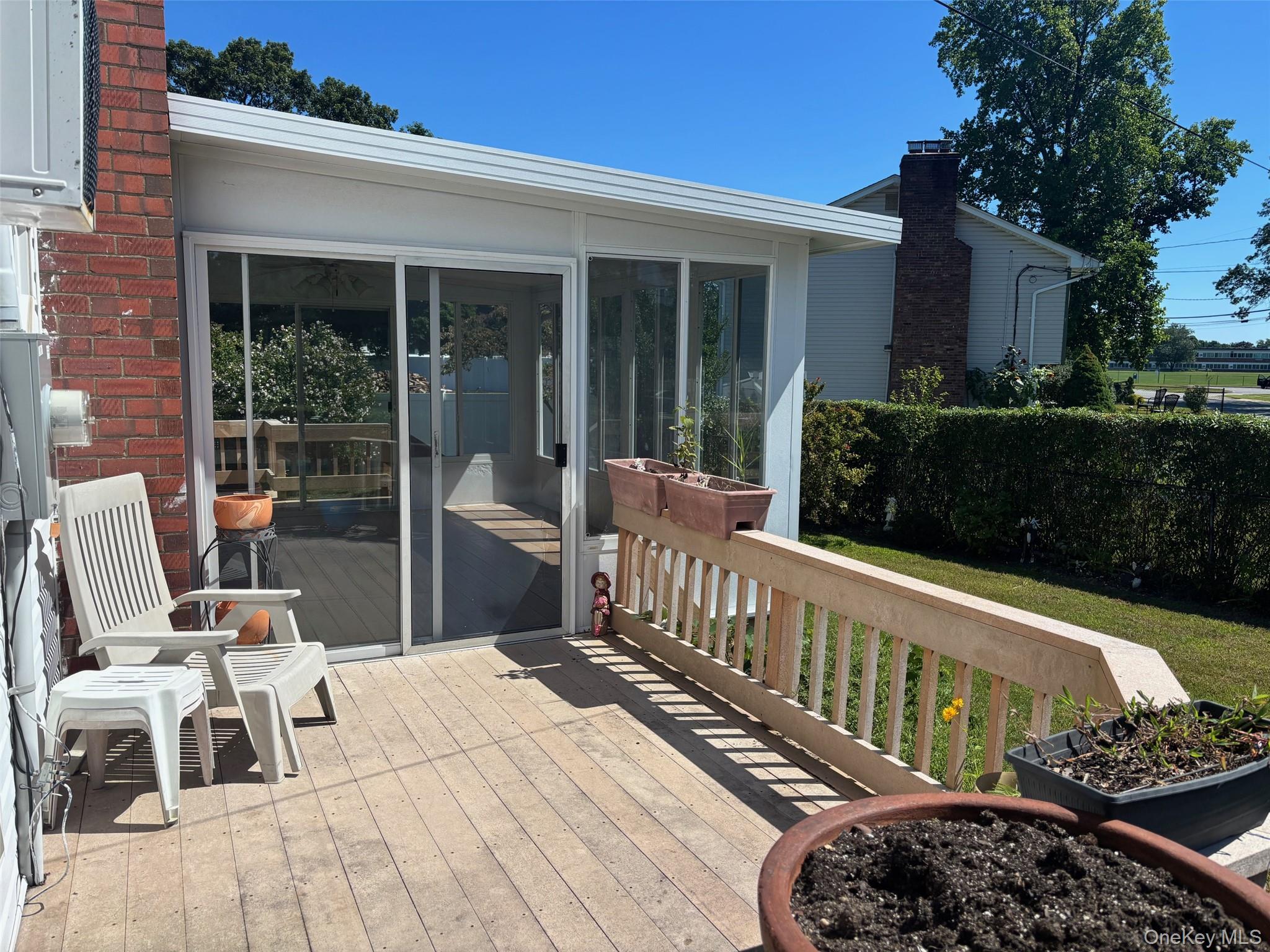 10 13th Avenue West Babylon, NY 11704 - Photo 29 of 33 a view of a chairs and tables in the balcony