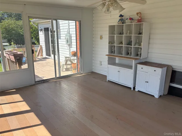 a view of a livingroom with furniture