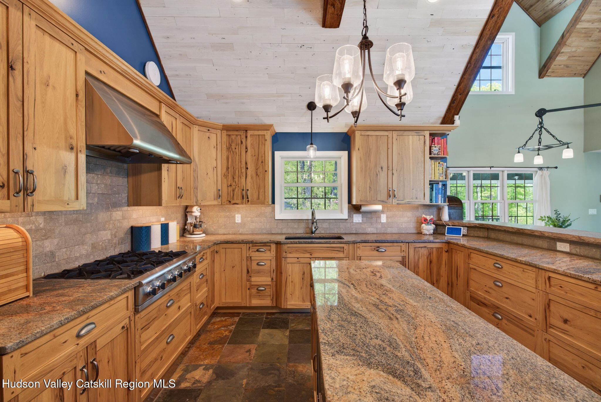 322 Morrison Road Acra, NY 12405 - Photo 9 of 49 a large kitchen with a large island in the center and stainless steel appliances