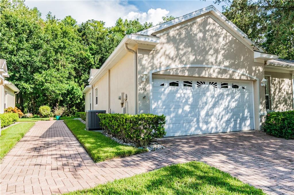 7641 Wimpole Drive New Port Richey, FL 34655 - Photo 1 of 1 a view of a back yard of the house