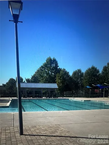 a view of a street with a park