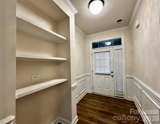 a view of an empty walk in closet
