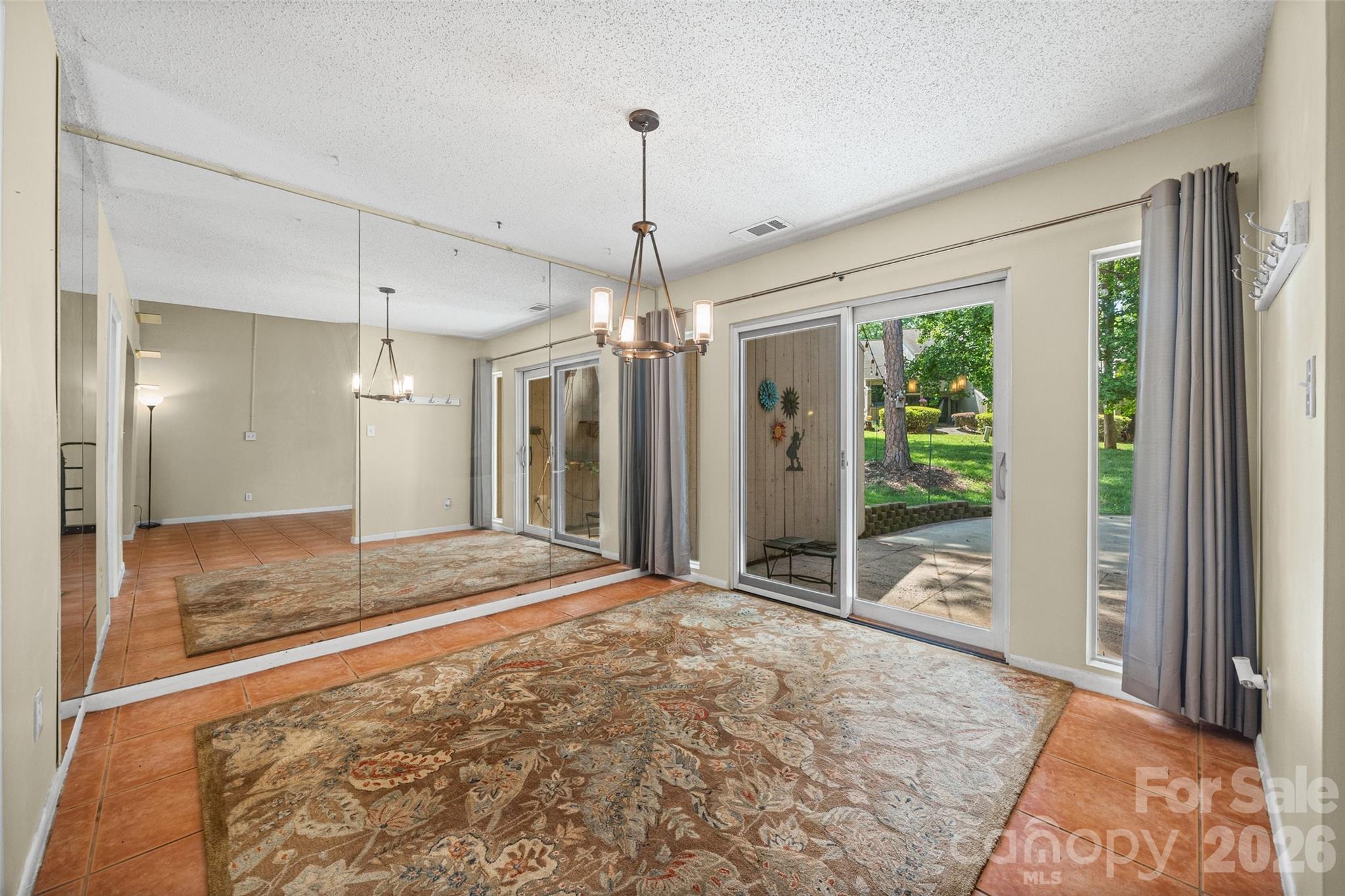 234 Riverview Terrace Clover, SC 29710 - Photo 14 of 35 a view of a room with wooden floor and windows