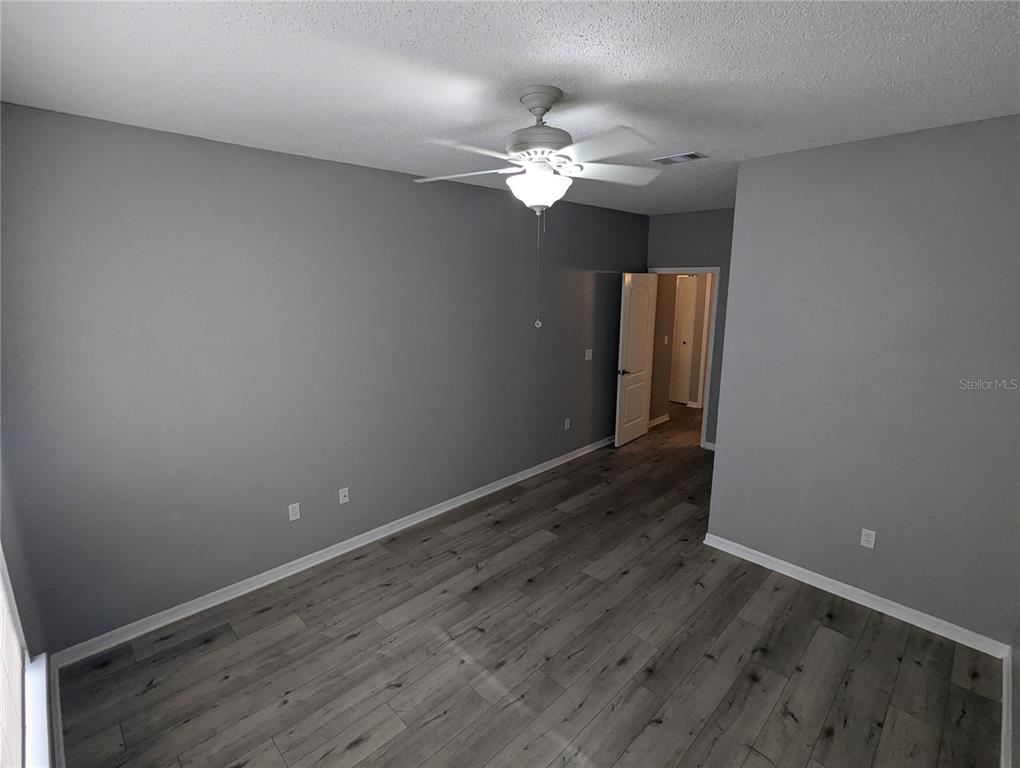 903 Normandy Trace Road Tampa, FL 33602 - Photo 13 of 14 a view of a livingroom with wooden floor