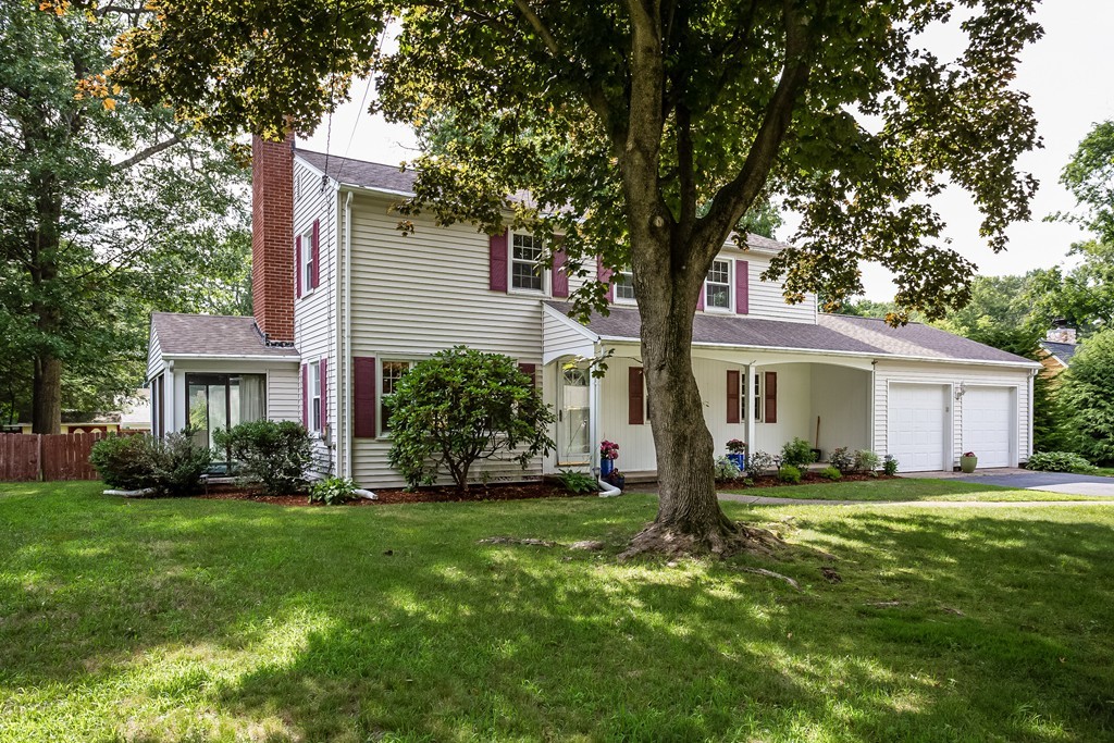 58 Robin Road Longmeadow, MA 01106 - Photo 3 of 30 a front view of house with yard and green space