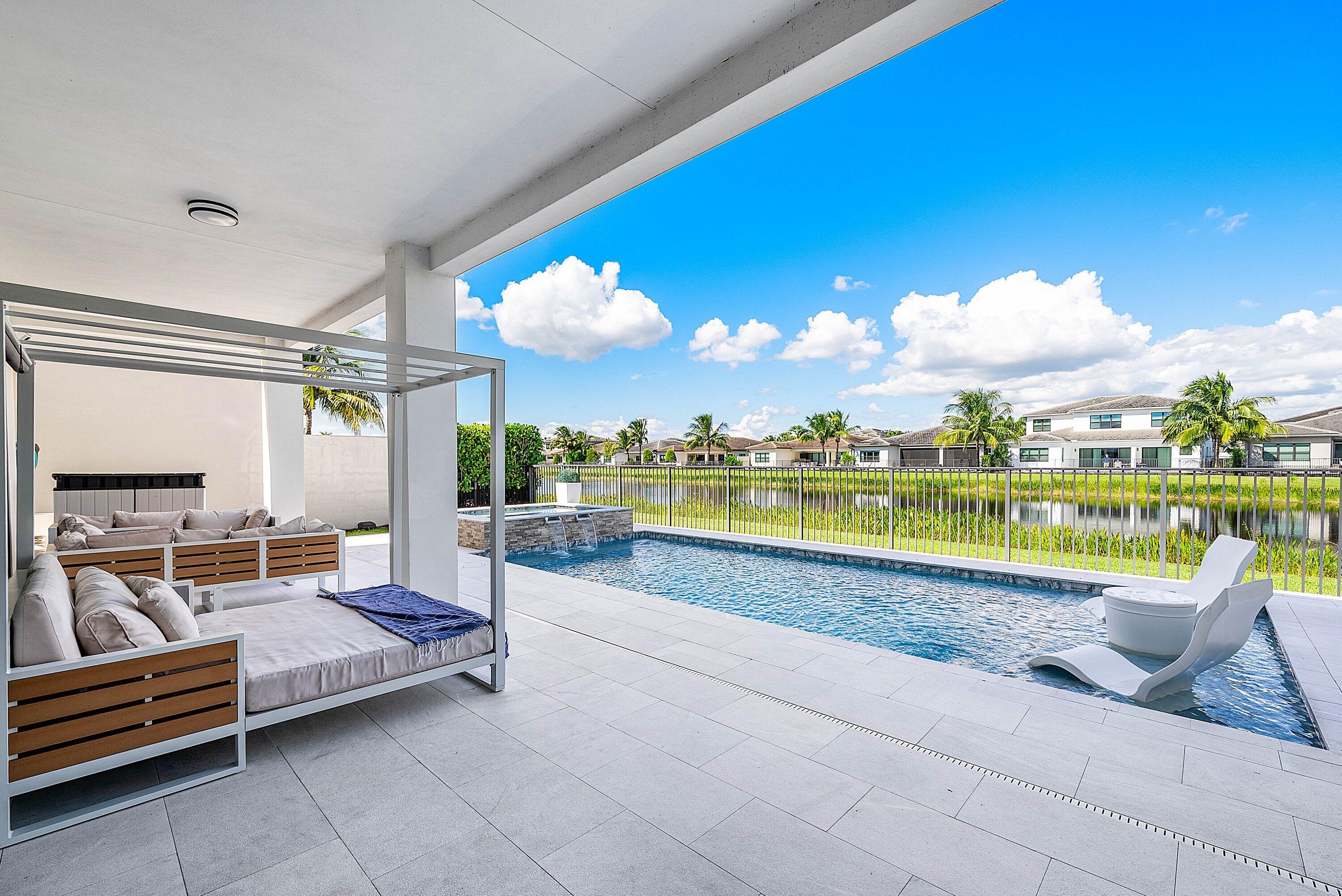 8805 New River Falls Road Boca Raton, FL 33496 - Photo 54 of 79 Resort-style covered lanai