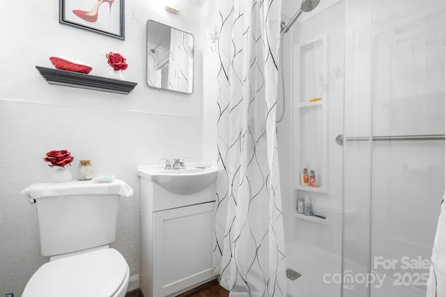 a bed room with a bed and a window