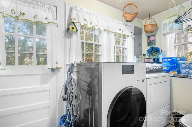 a view of house with outdoor seating area