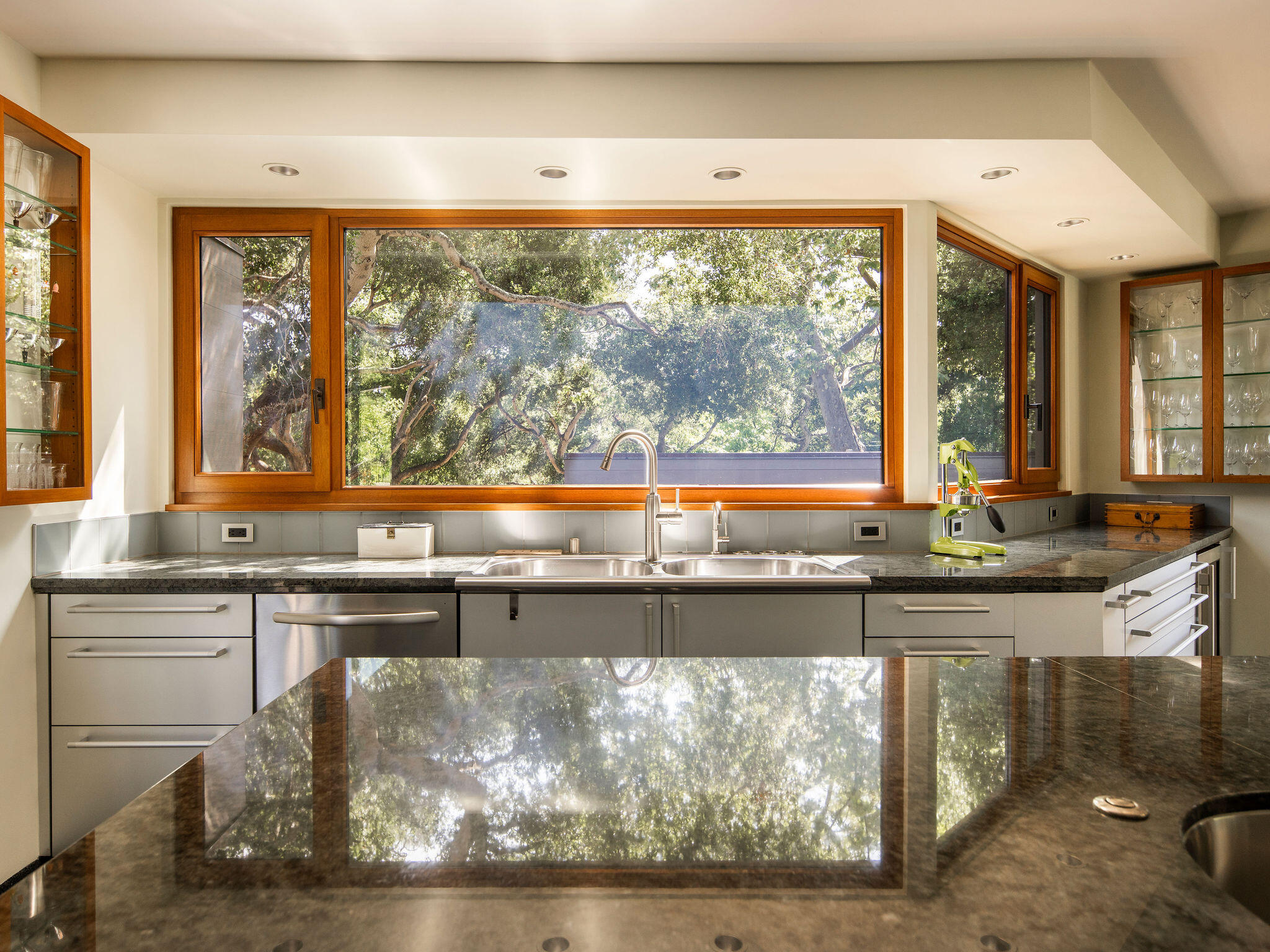 650 San Ysidro Road Montecito, CA 93108 - Photo 25 of 54 a kitchen with a sink and large window