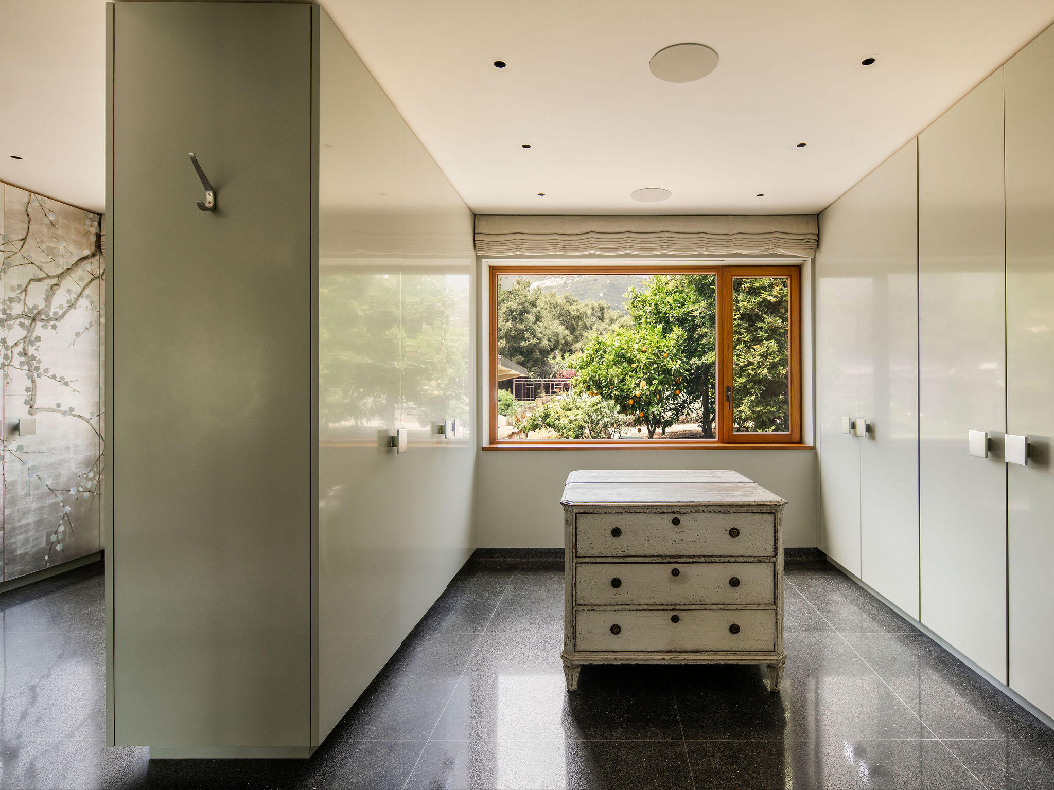 650 San Ysidro Road Montecito, CA 93108 - Photo 28 of 54 a view of hallway with a large window and wooden floor