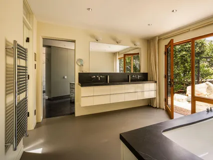 a room with furniture and a large window