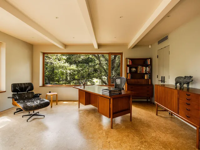 a room with furniture and a window