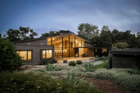 a view of a town with couple of houses