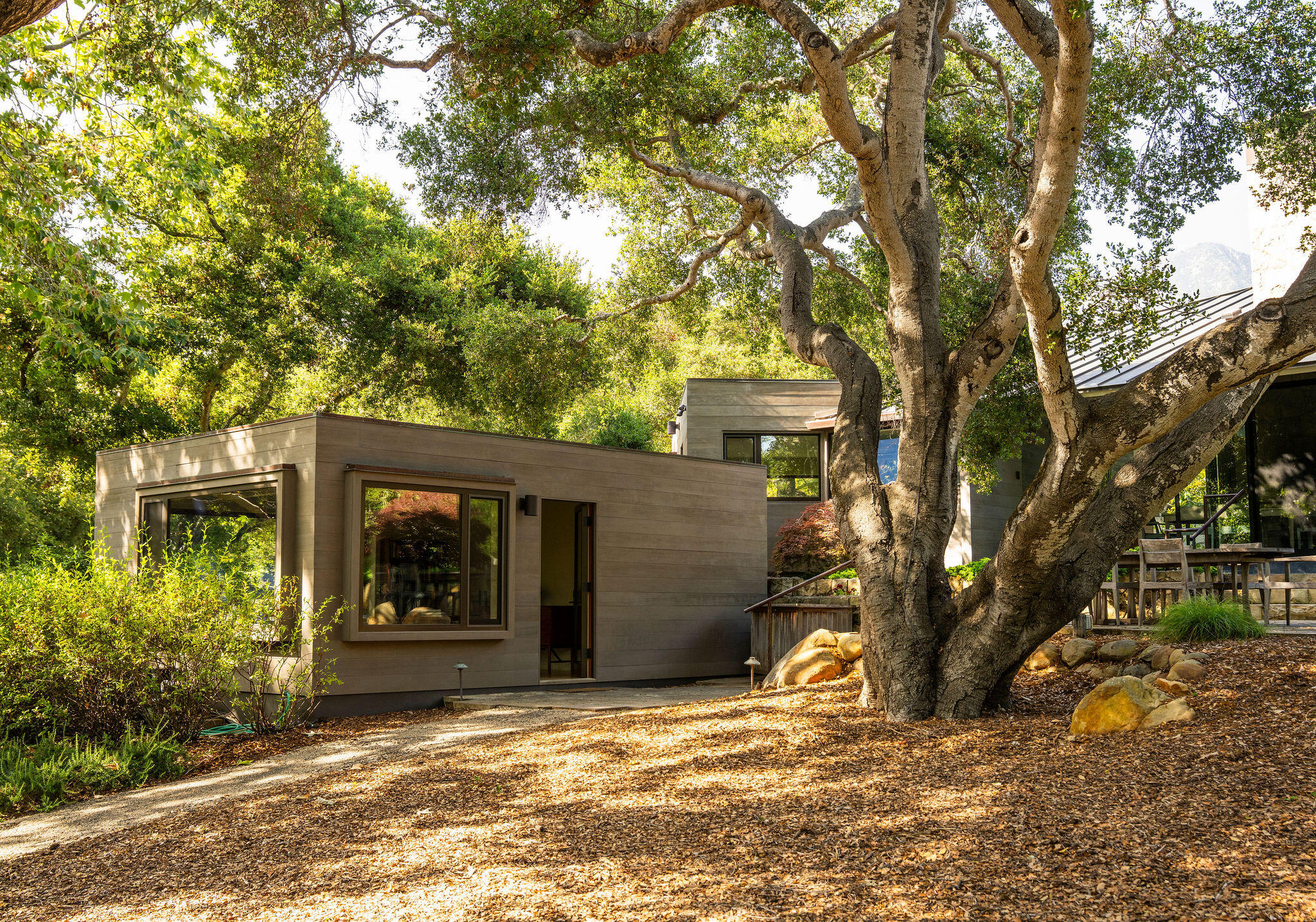 650 San Ysidro Road Montecito, CA 93108 - Photo 43 of 54 a view of a house with a tree in front