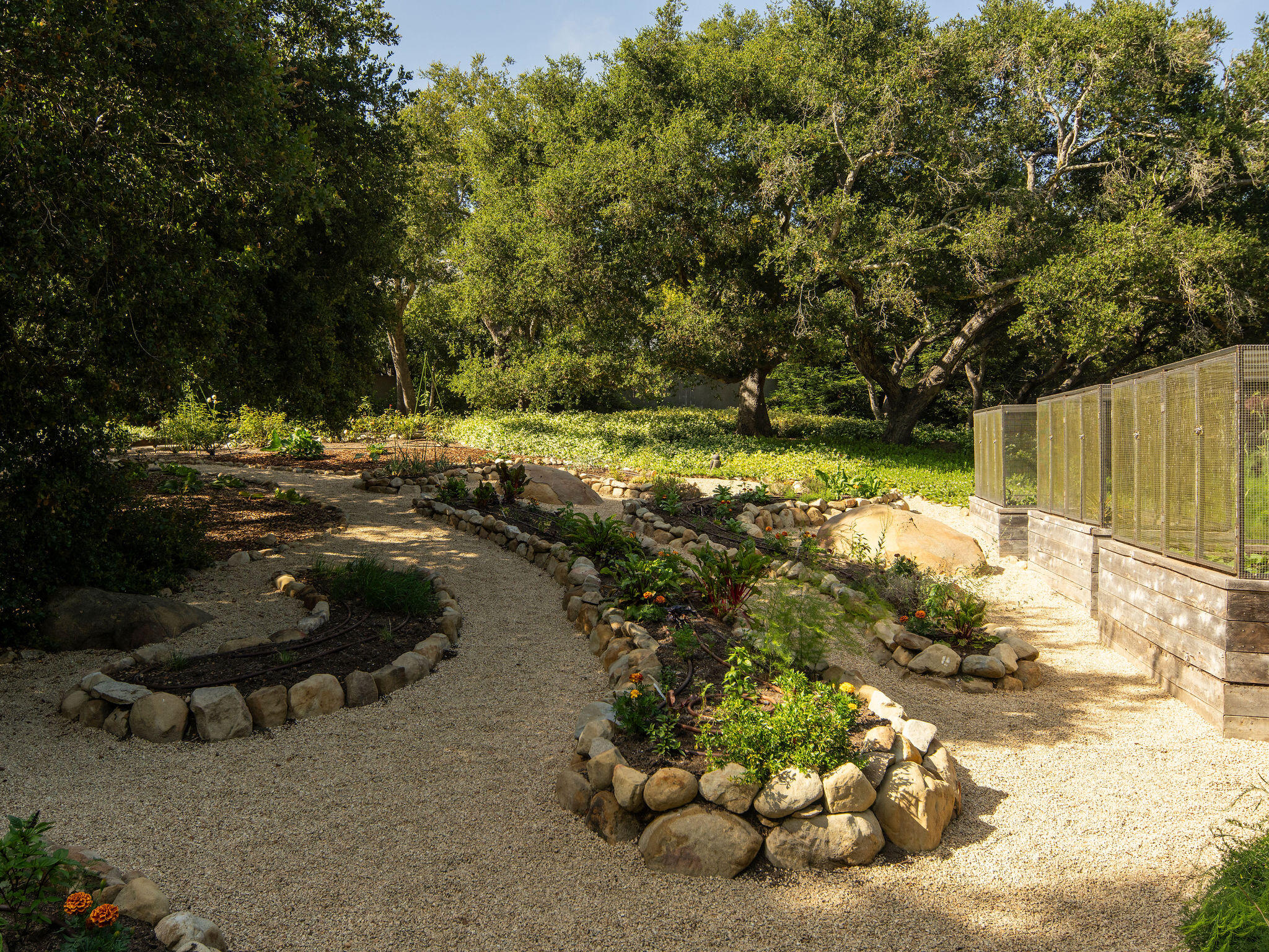 650 San Ysidro Road Montecito, CA 93108 - Photo 46 of 54 a backyard of a house with lots of green space