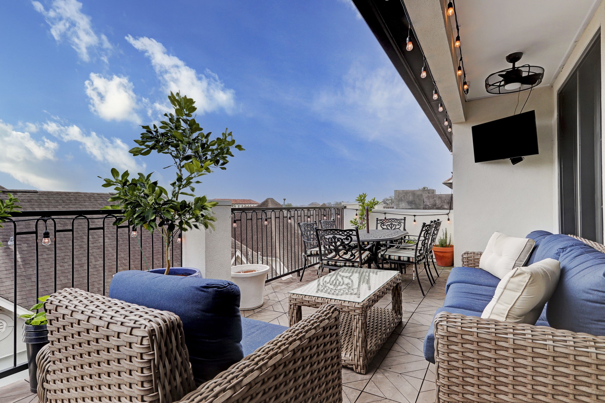 5218 Crawford Street Houston, TX 77004 - Photo 4 of 22 Another view of the spacious roof top terrace. The TV stays !!