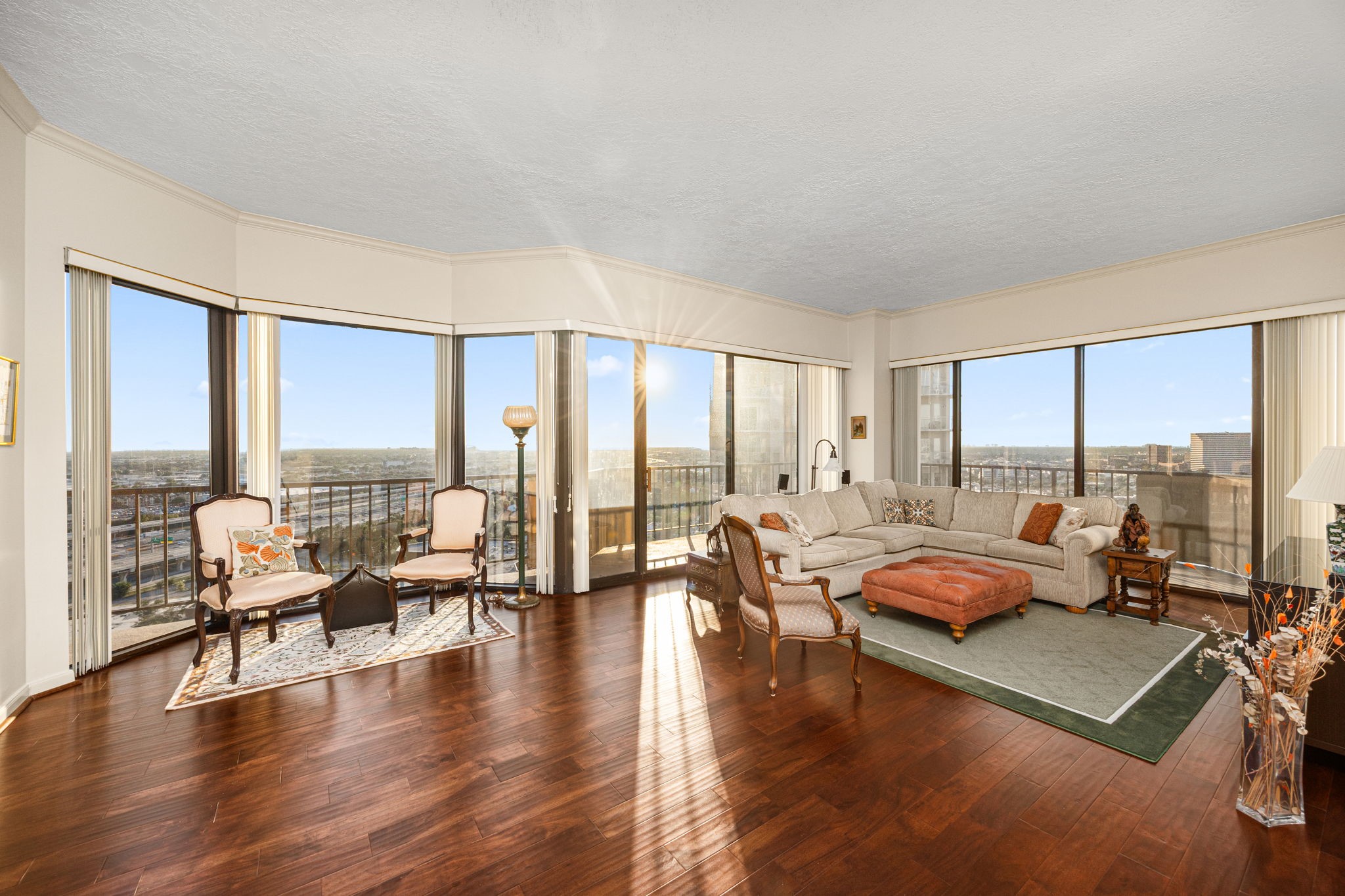 3350 McCue Road, Unit 2302 Houston, TX 77056 - Photo 6 of 35 The living room is spacious enough for a sectional sofa and additional sitting area. The 23rd floor views create a perfect backdrop to relax or entertain in.