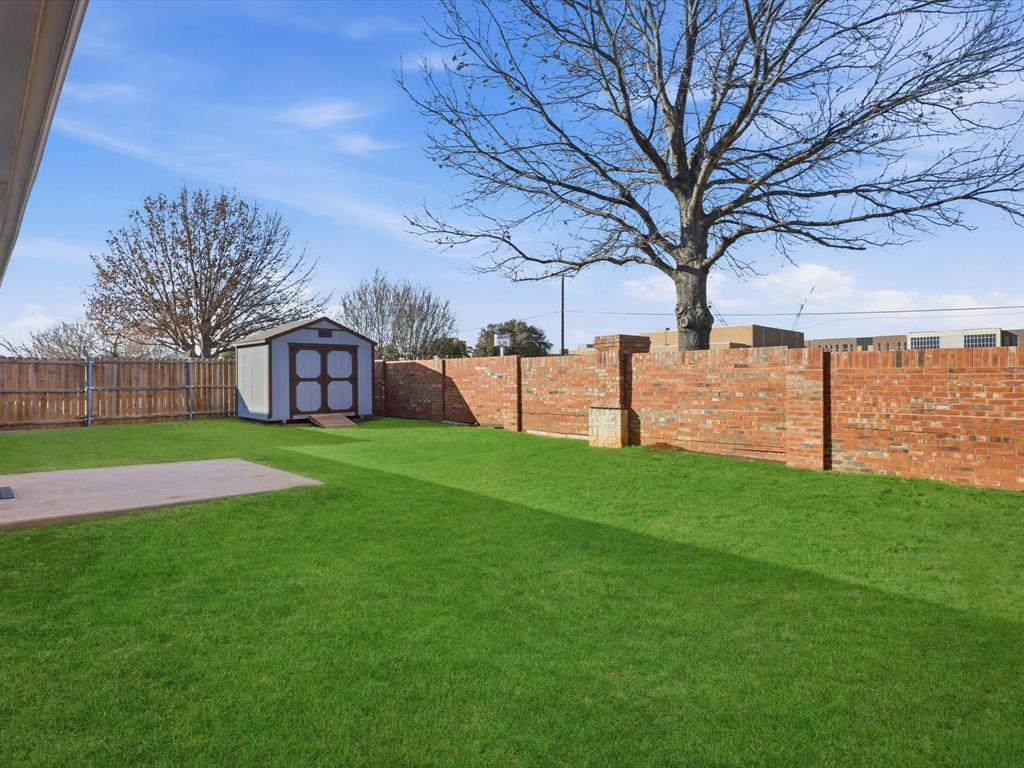 424 Shady Shore Lane Crowley, TX 76036 - Photo 35 of 40 a view of a house with a yard