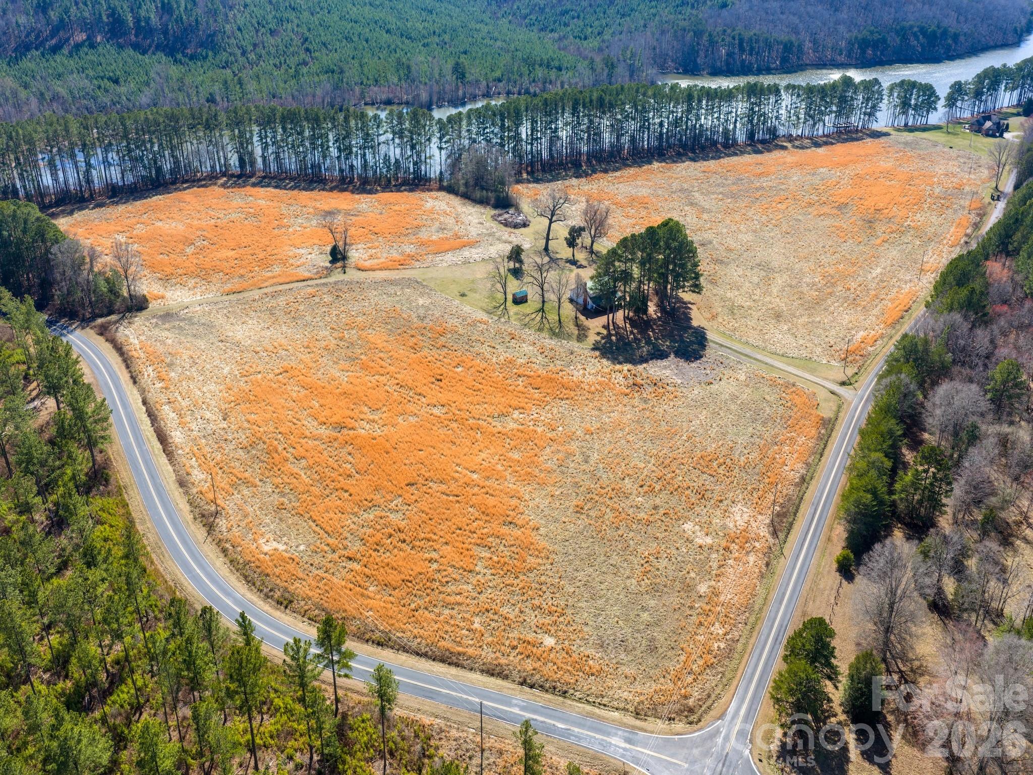 1347 Newsom Road Denton, NC 27239 - Photo 15 of 47 a view of a swimming pool with a yard