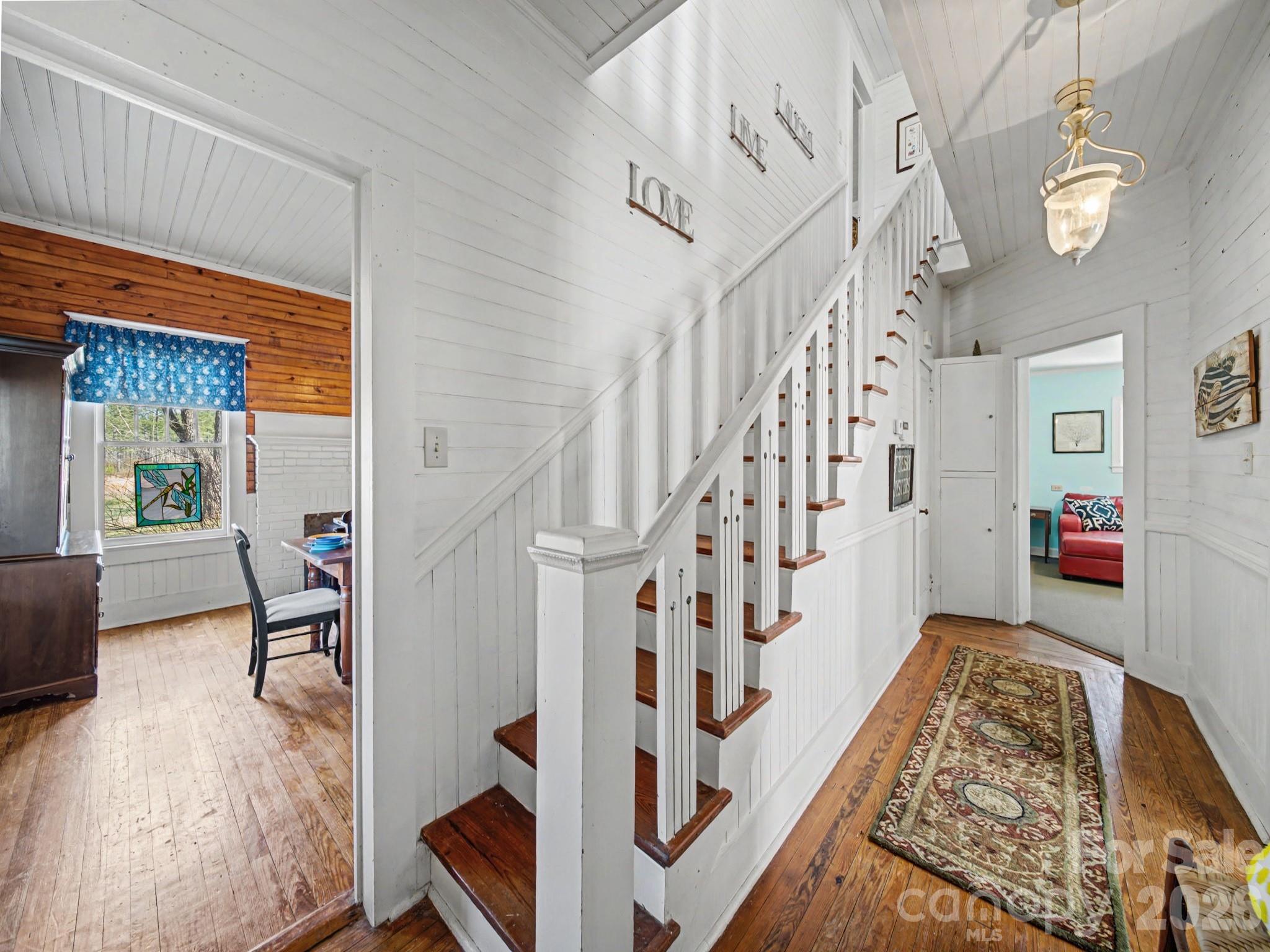 1347 Newsom Road Denton, NC 27239 - Photo 29 of 47 a view of entryway livingroom and hall with wooden floor