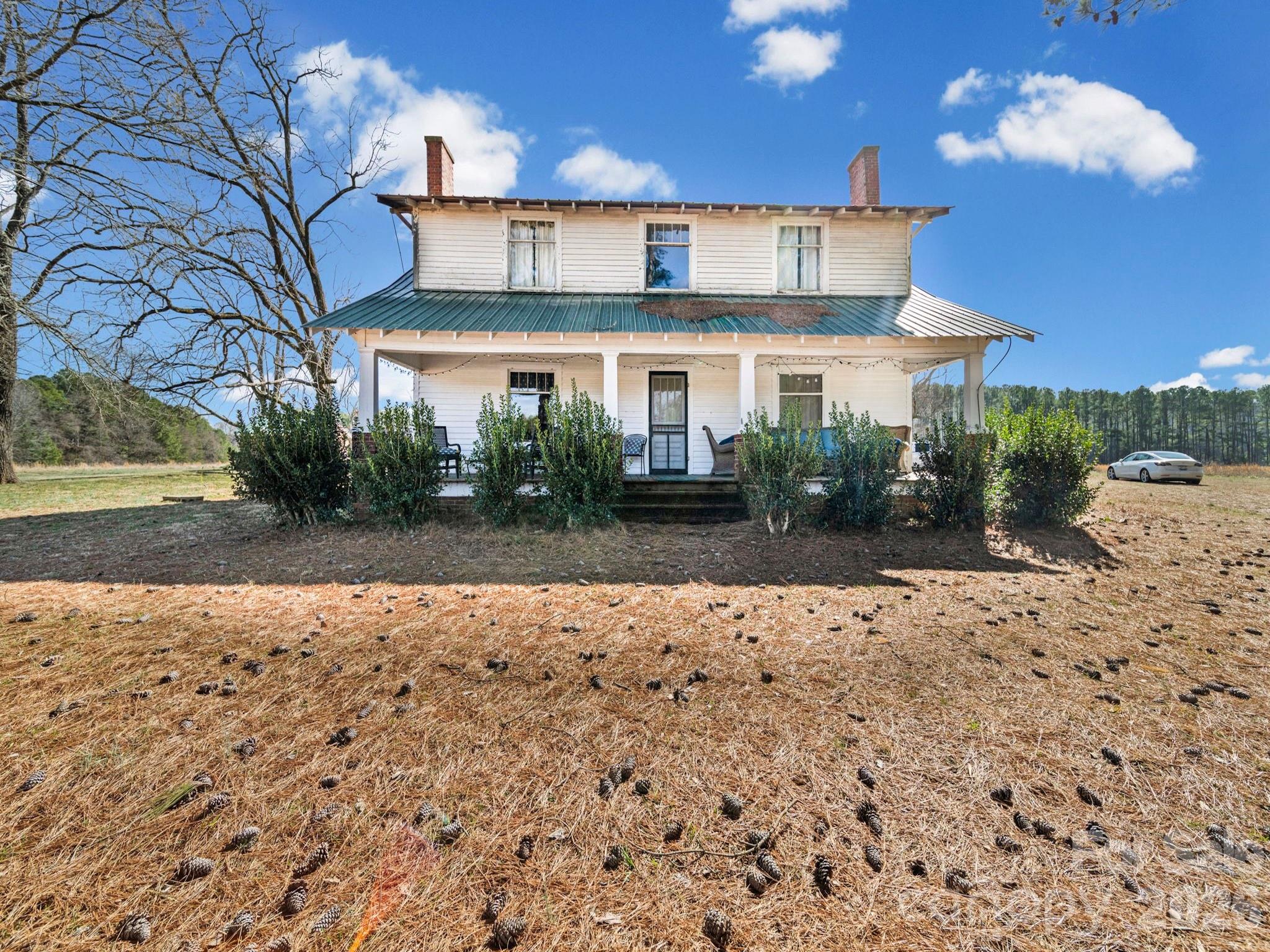 1347 Newsom Road Denton, NC 27239 - Photo 5 of 47 a front view of a house with a yard