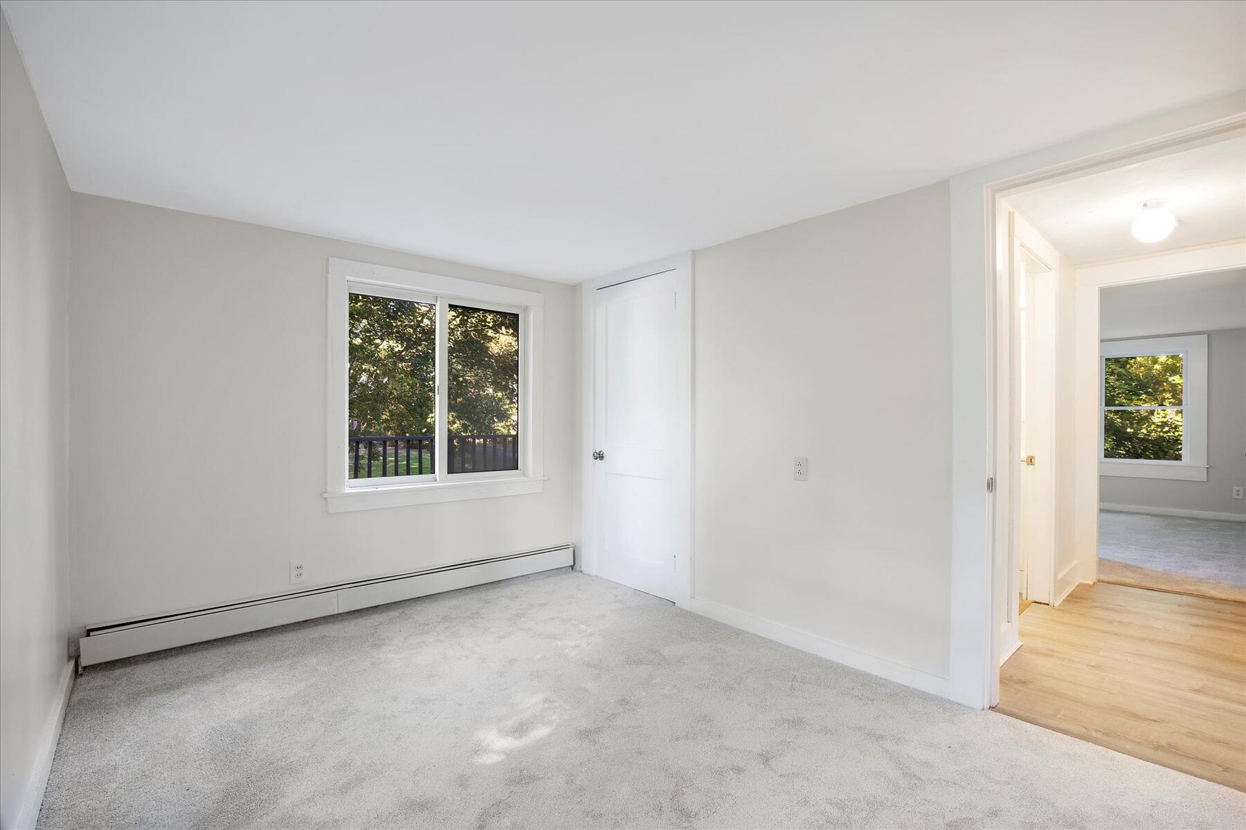 254 Barlows Landing Road Pocasset, MA 02559 - Photo 13 of 27 an empty room with windows