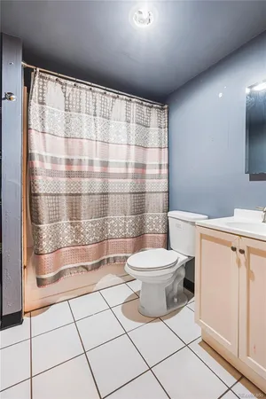 a view of a livingroom with a staircase