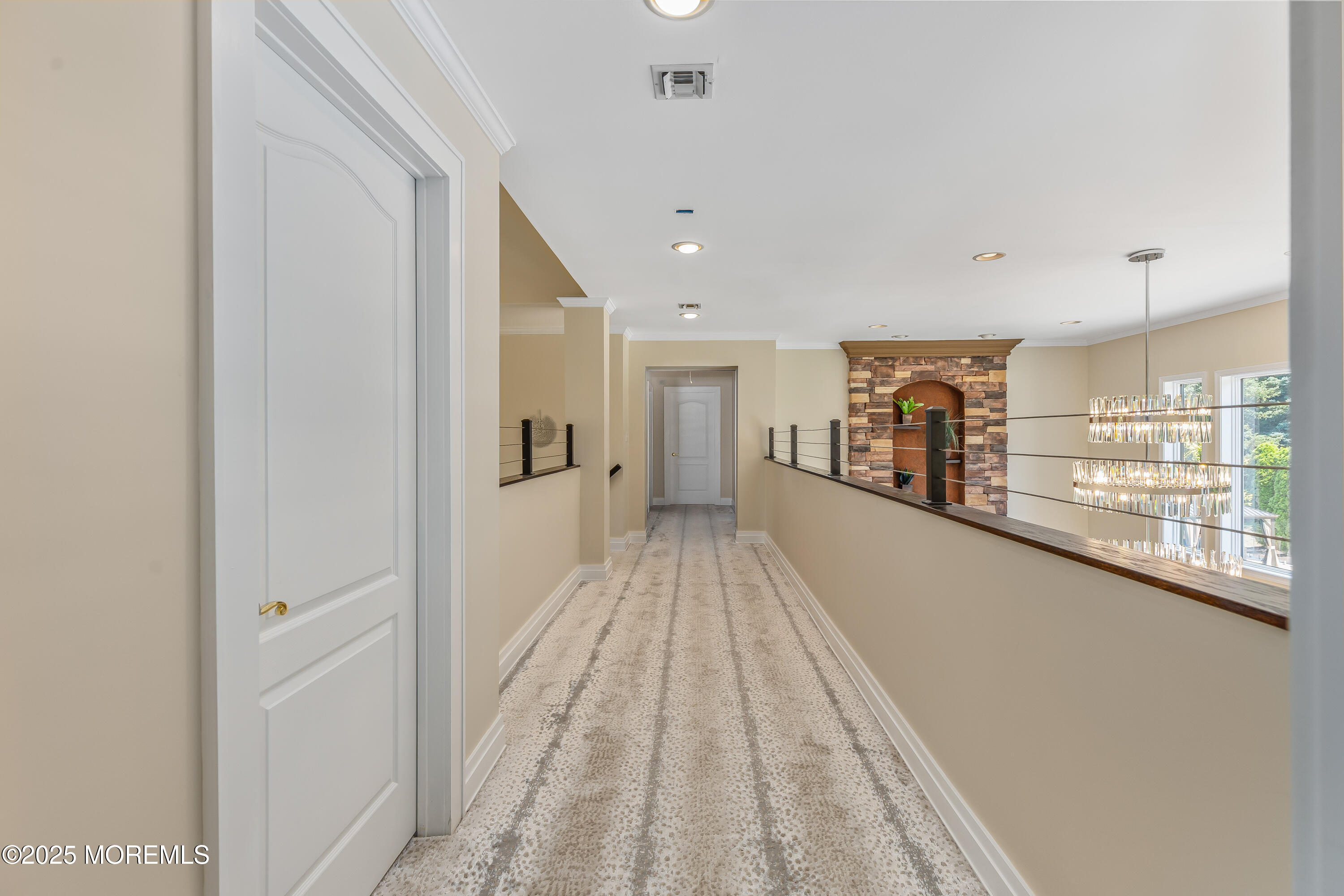 806 Turquoise Trail Morganville, NJ 07751 - Photo 22 of 62 a view of a hallway with wooden floor