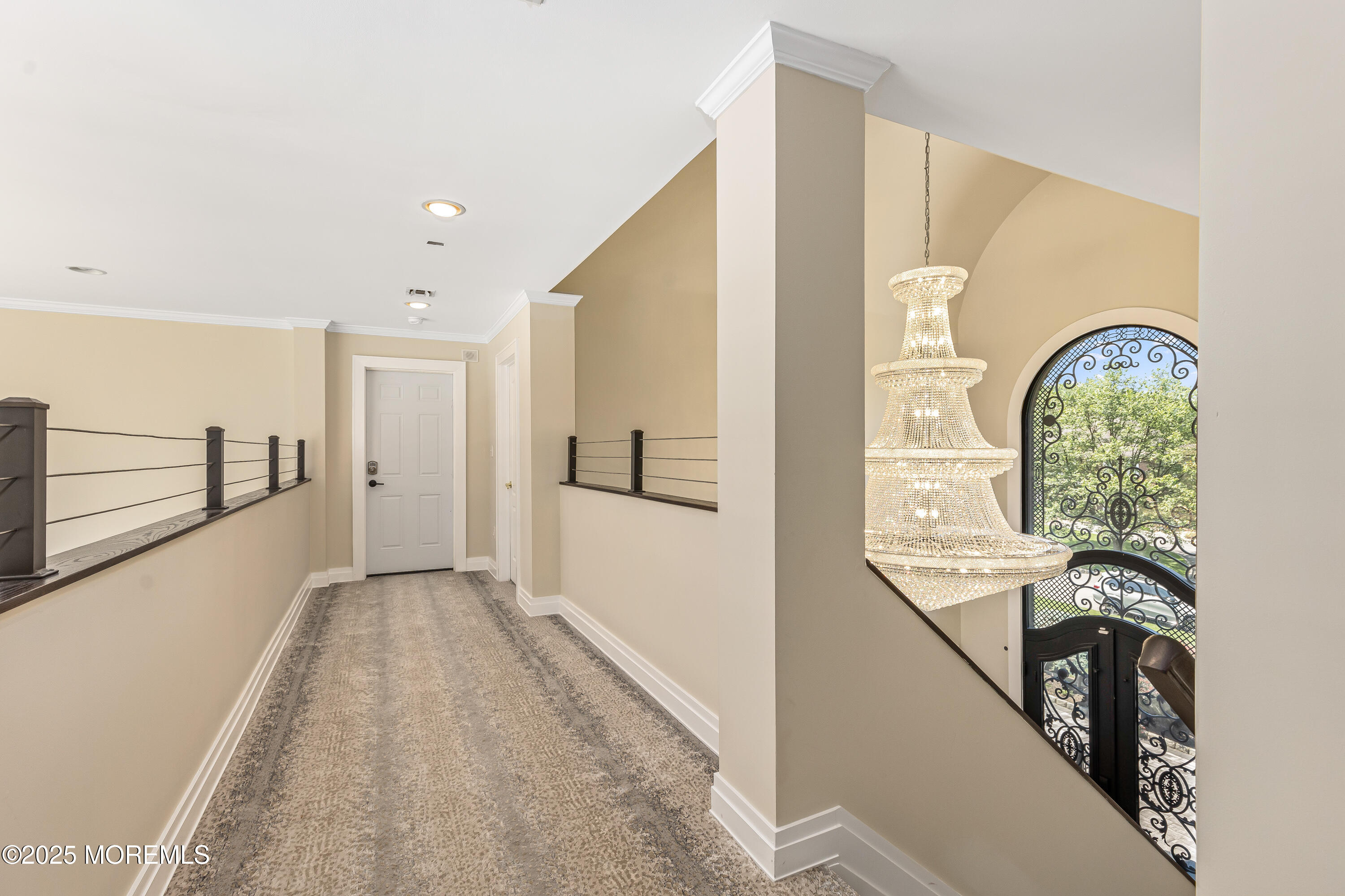 806 Turquoise Trail Morganville, NJ 07751 - Photo 23 of 62 a view of a hallway with entryway window and front door