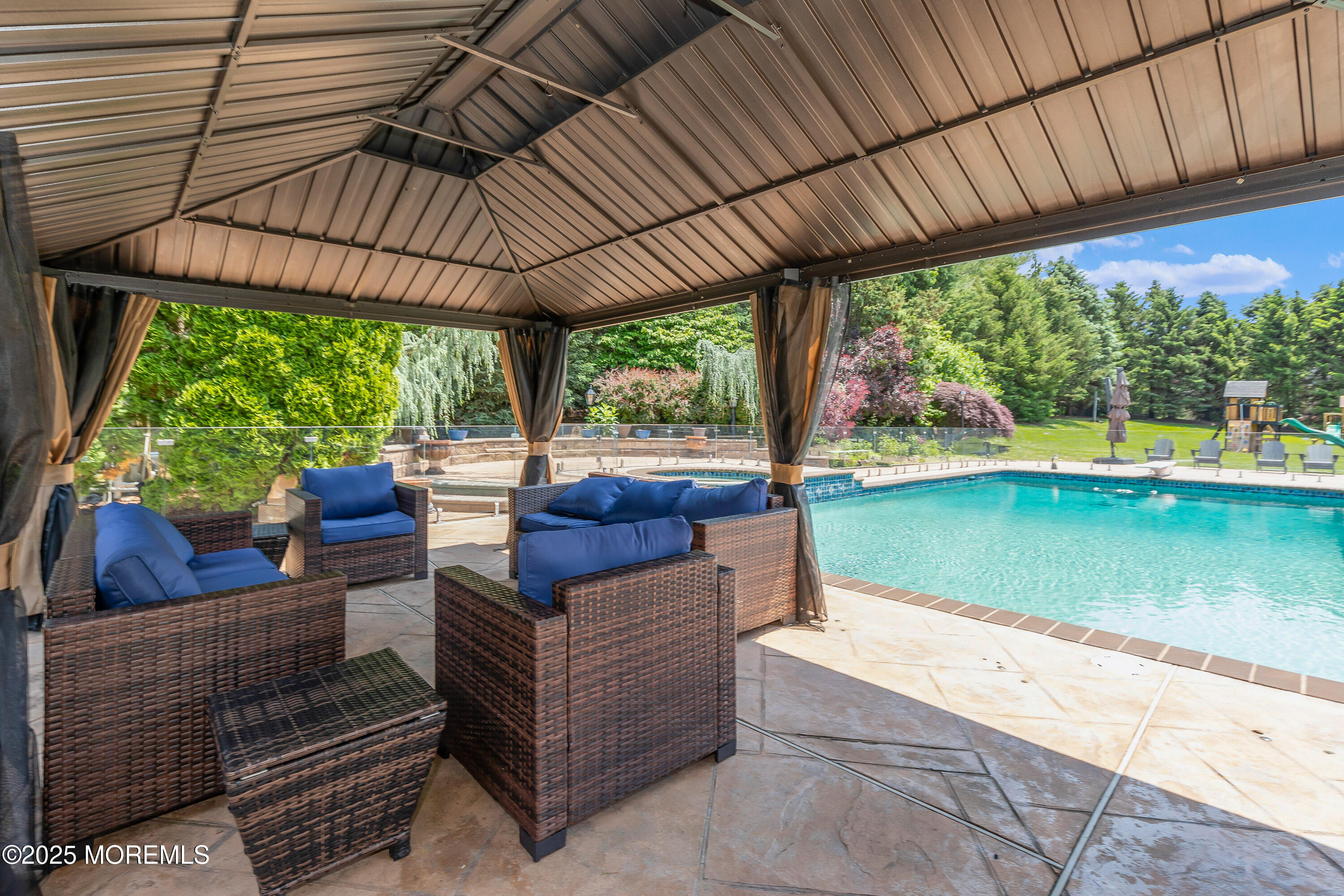 806 Turquoise Trail Morganville, NJ 07751 - Photo 37 of 62 a view of swimming pool with a back yard
