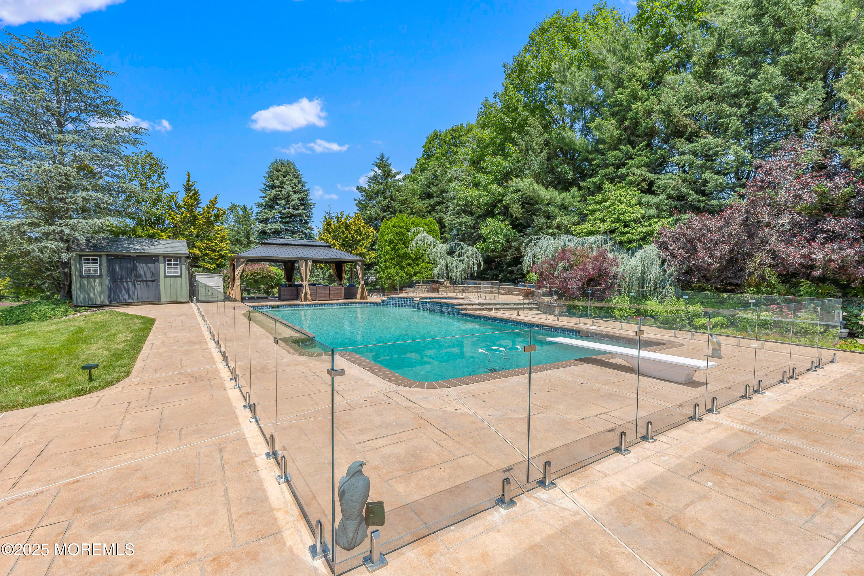 806 Turquoise Trail Morganville, NJ 07751 - Photo 39 of 62 a view of a backyard with a garden and entertaining space
