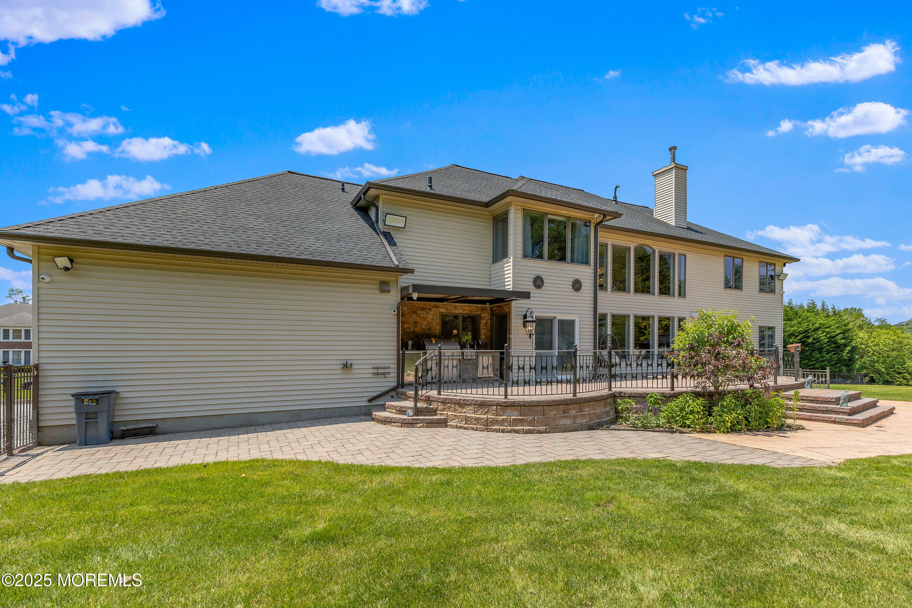 806 Turquoise Trail Morganville, NJ 07751 - Photo 43 of 62 a front view of a house with a yard