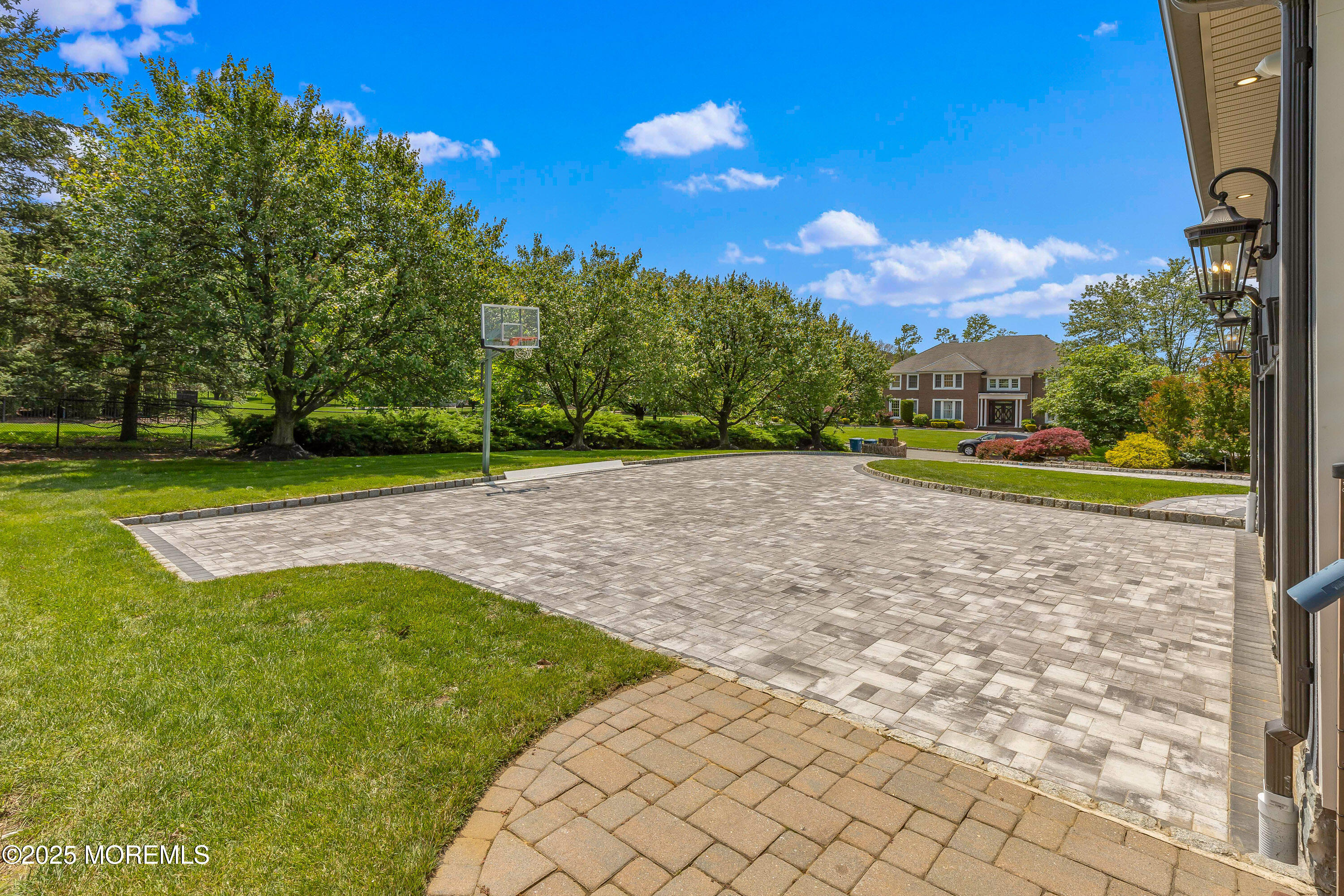 806 Turquoise Trail Morganville, NJ 07751 - Photo 52 of 62 a view of a road with a yard
