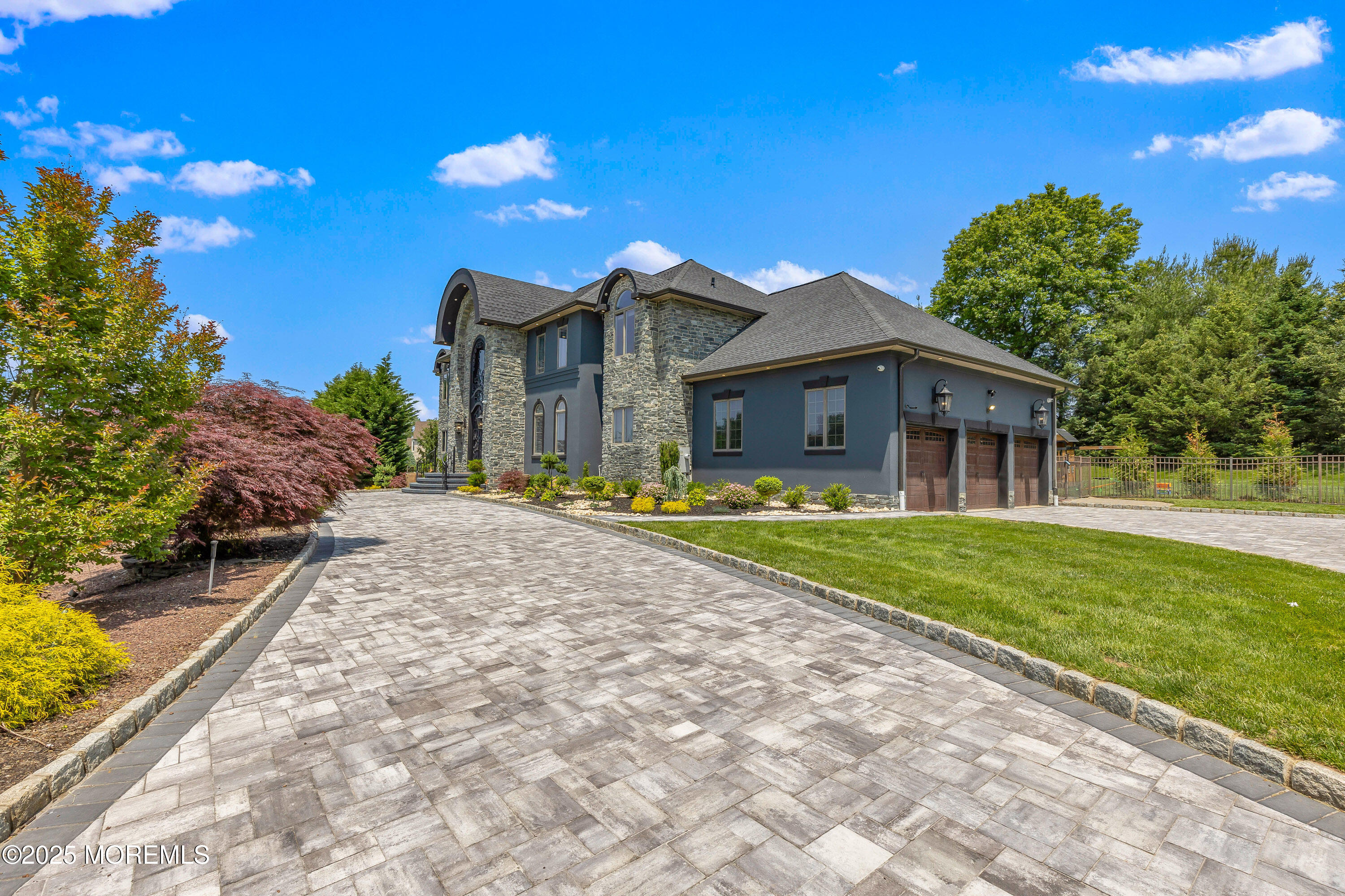 806 Turquoise Trail Morganville, NJ 07751 - Photo 59 of 62 a front view of a house with a yard