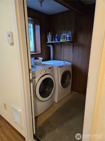 a utility room with dryer and washer