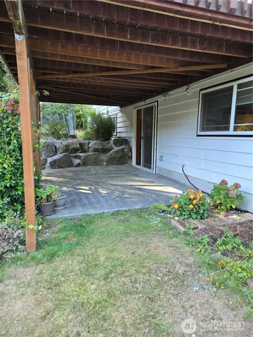 a backyard of a house with lots of green space