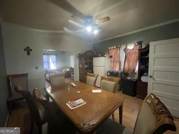a view of a dining room with furniture