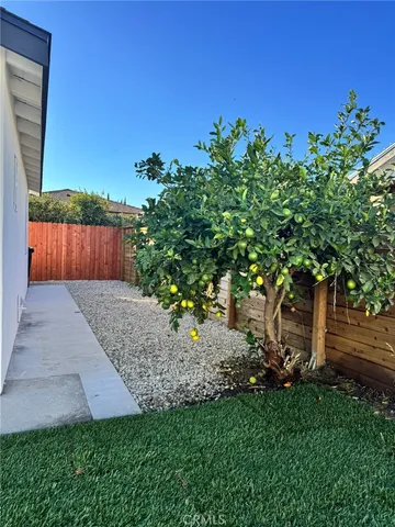 a view of a house with a big yard