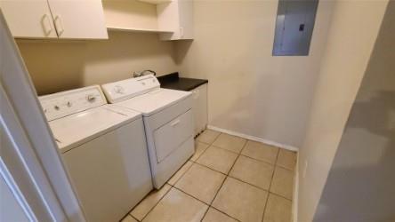 2409 Leon Street, Unit 301 Austin, TX 78705 - Photo 10 of 10 a utility room with dryer and washer