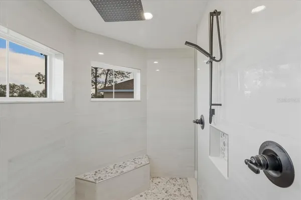 a kitchen with sink cabinets and stove