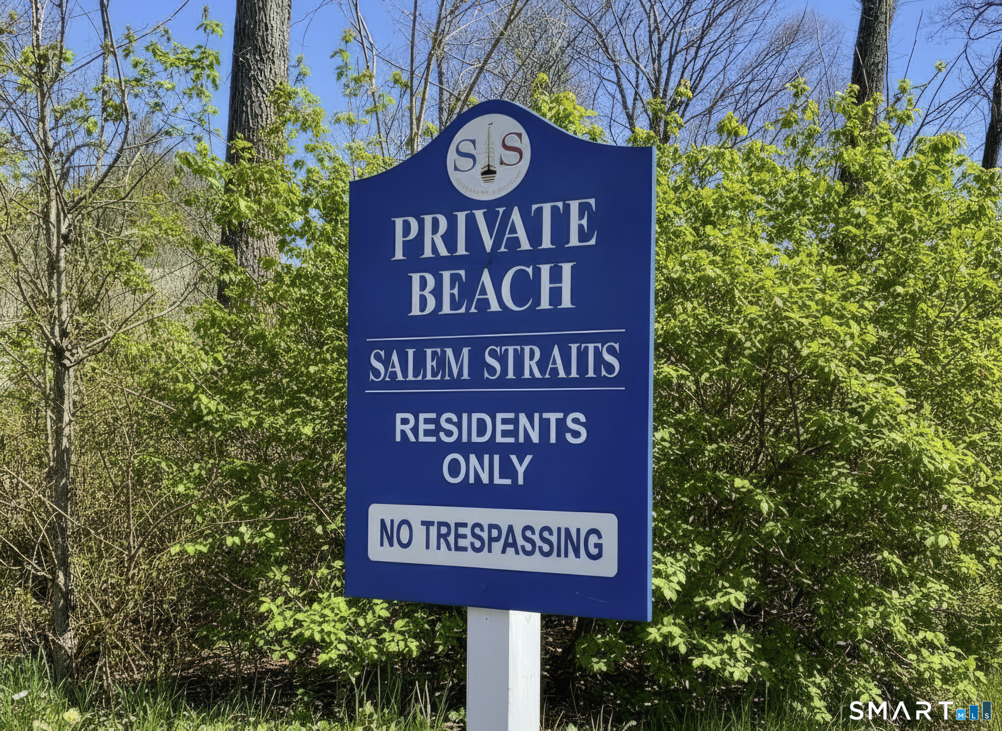 7 Whaling Road Darien, CT 06820 - Photo 31 of 34 a sign board with a clock on the wall