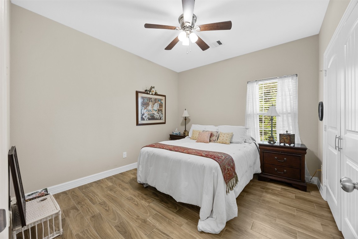 42 Trail Lake Trinity, TX 75862 - Photo 20 of 50 a bed room with a bed and a window