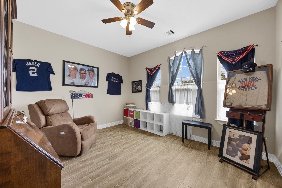 42 Trail Lake Trinity, TX 75862 - Photo 22 of 50 a living room with furniture and a flat screen tv