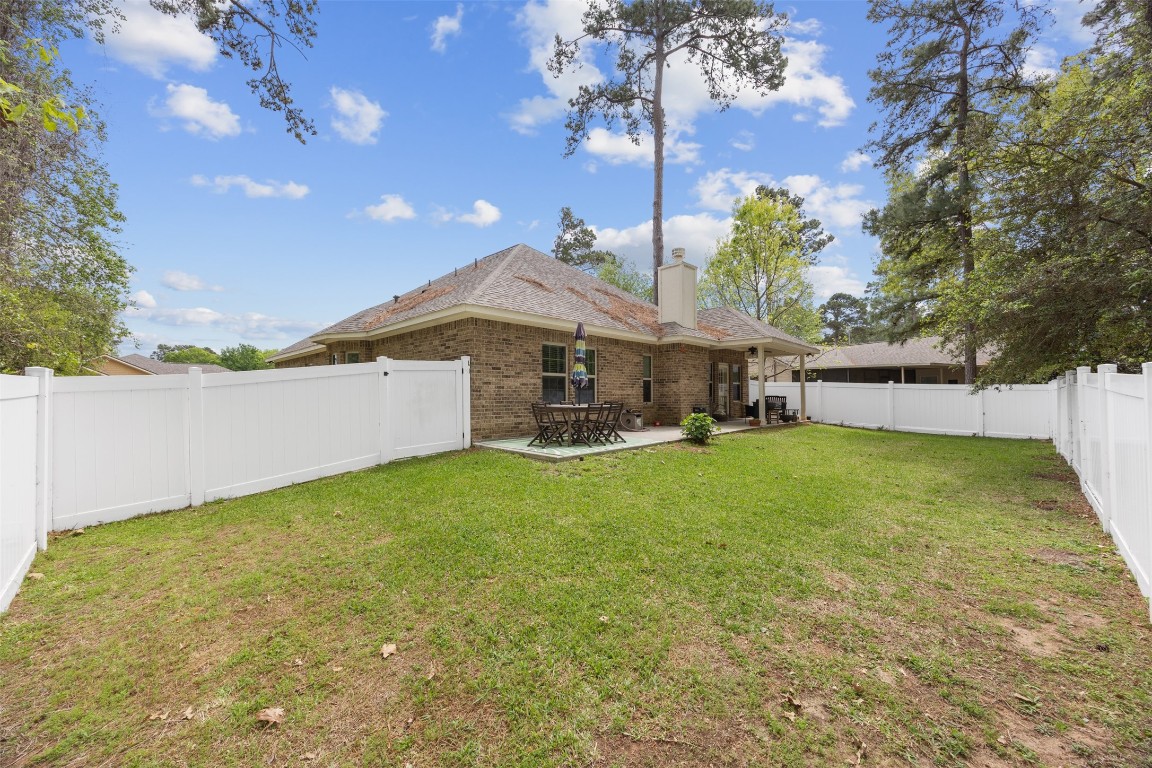 42 Trail Lake Trinity, TX 75862 - Photo 28 of 50 a house view with a garden space