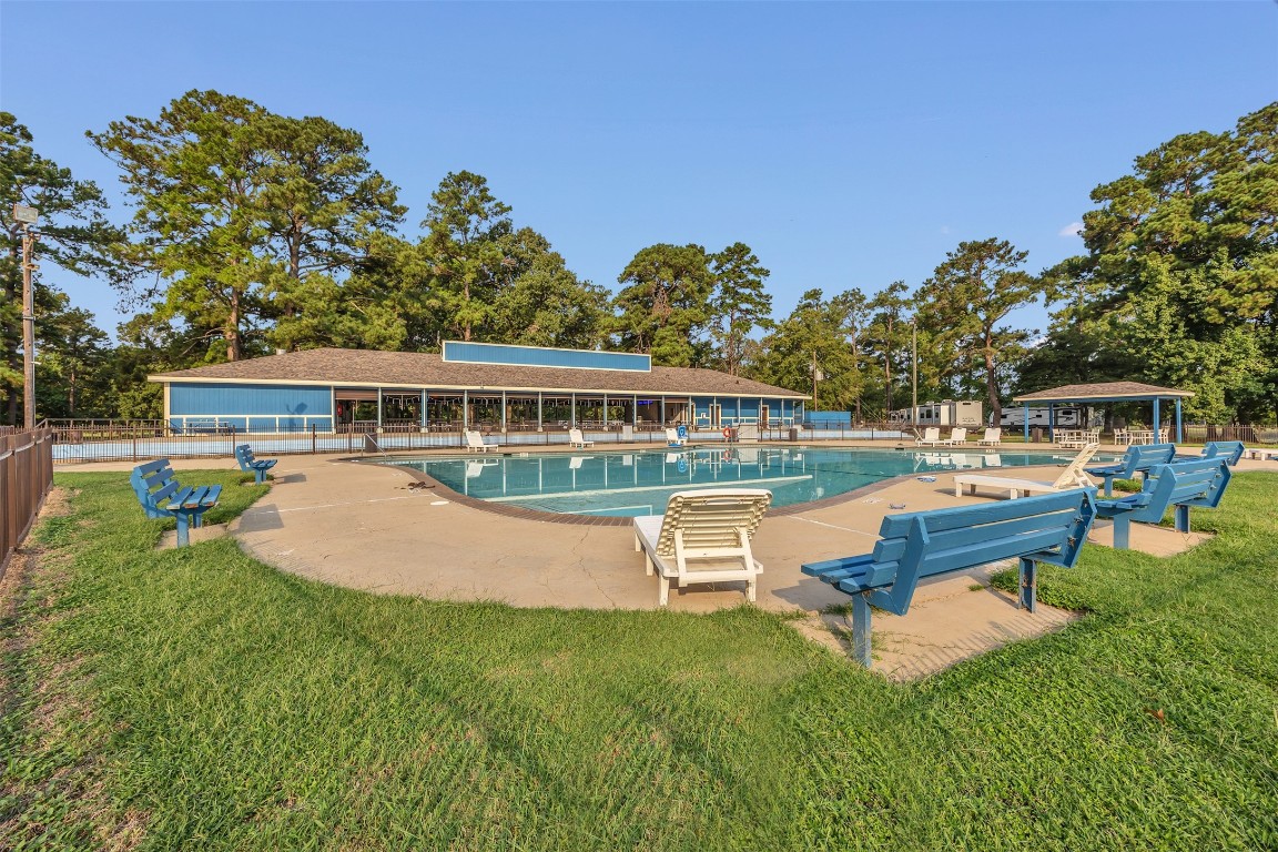 42 Trail Lake Trinity, TX 75862 - Photo 41 of 50 a view of a house with swimming pool and sitting area